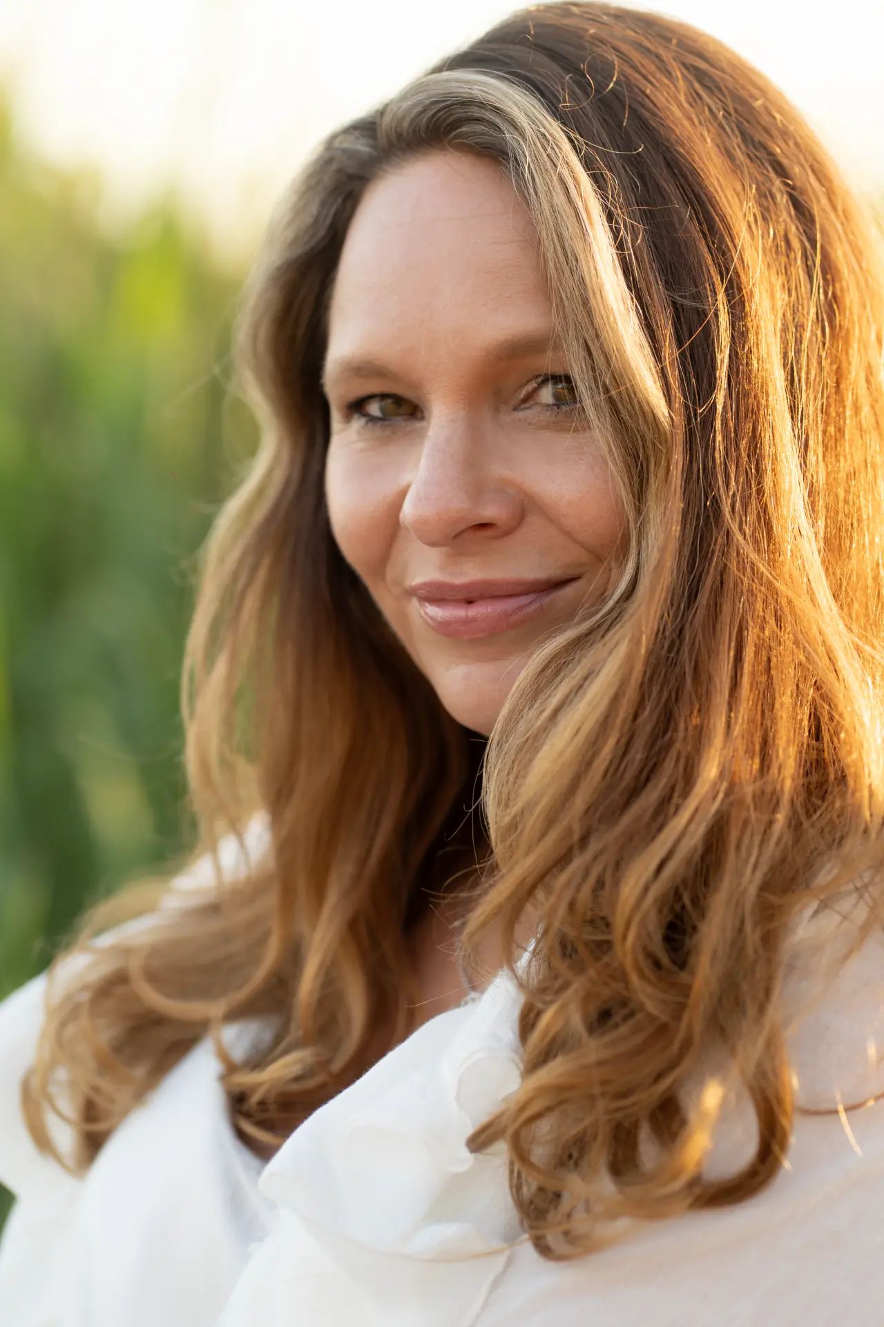 Close portrait of Marjolijn among the reeds