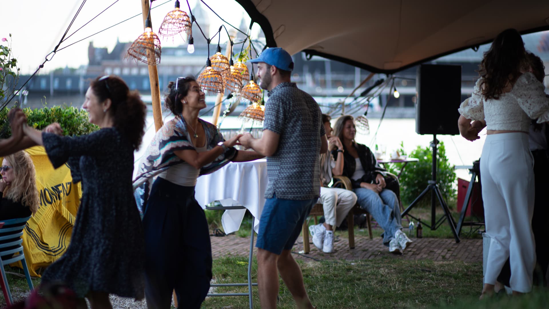 Guests dancing beneath the El Momento canopy
