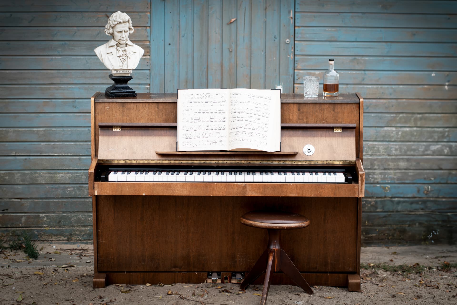 Peter's piano with a Beethoven bust and sheet music