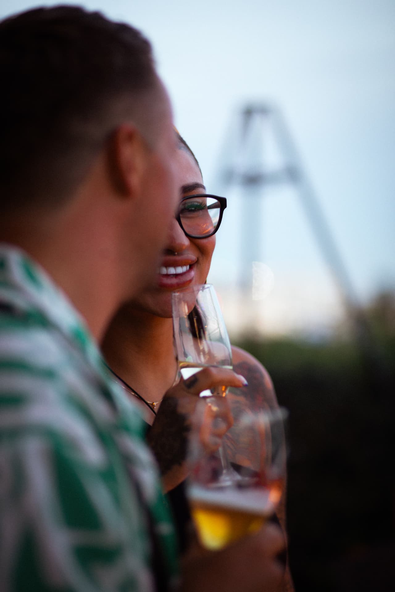 Guests sharing drinks at Tardes Colombianas