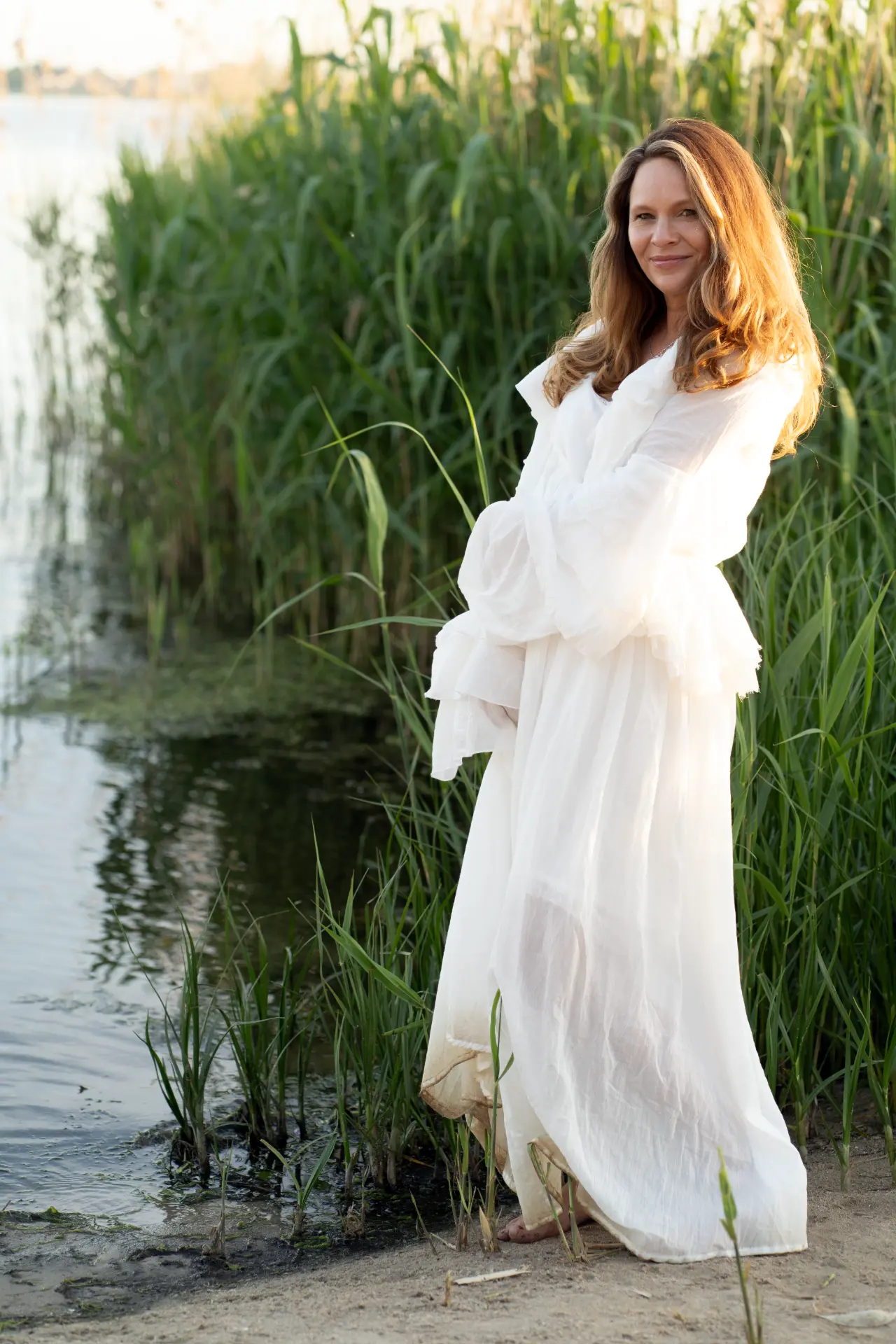 Marjolijn beside the water and reeds
