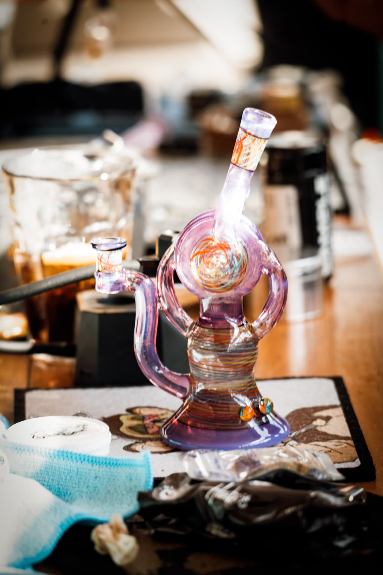 Glass piece catching the light on a table
