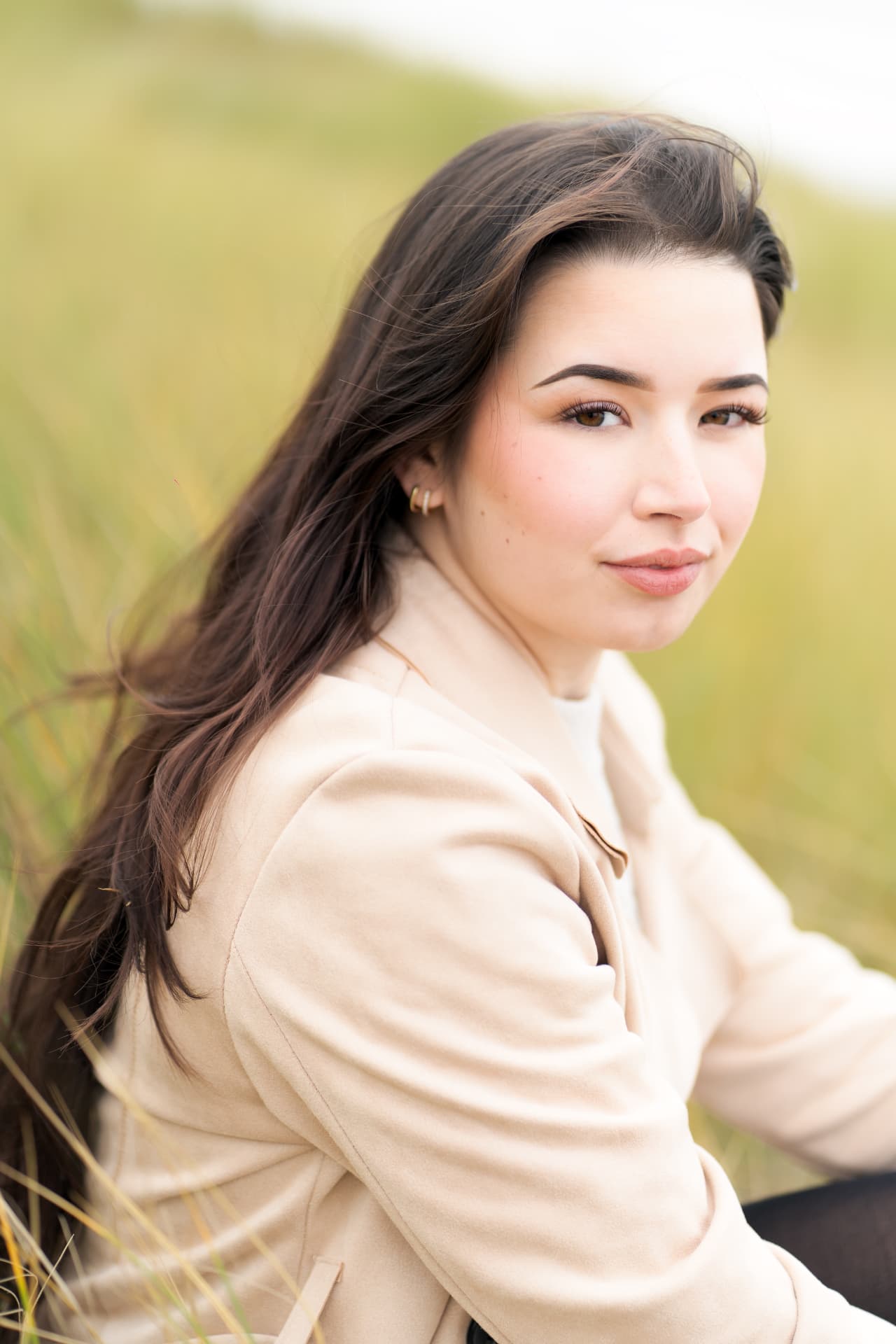 Portrait of the bride-to-be among the dune grass