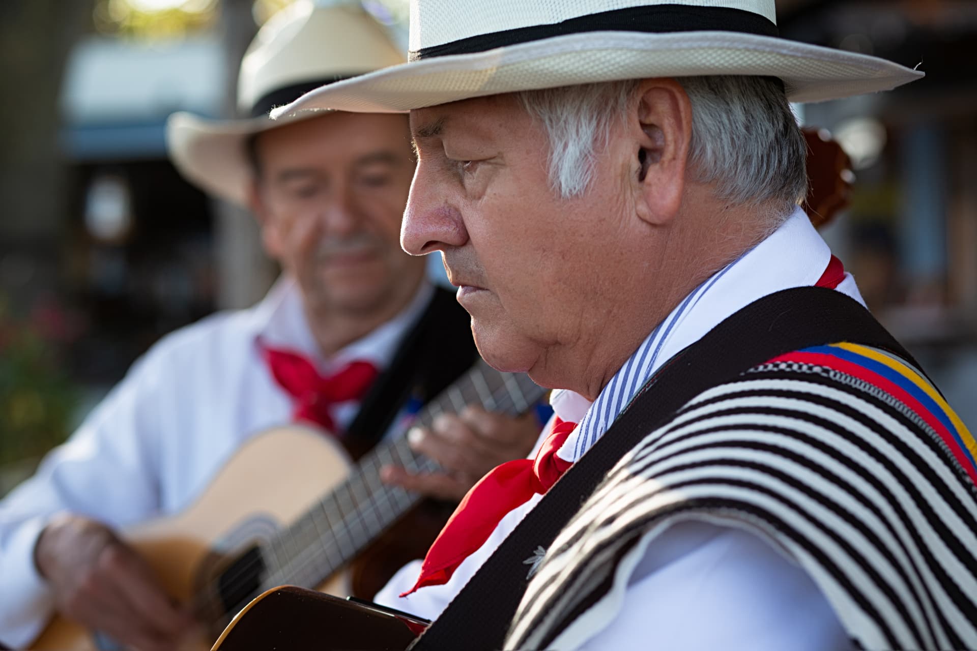 Colombian musicians performing together at Tardes Colombianas