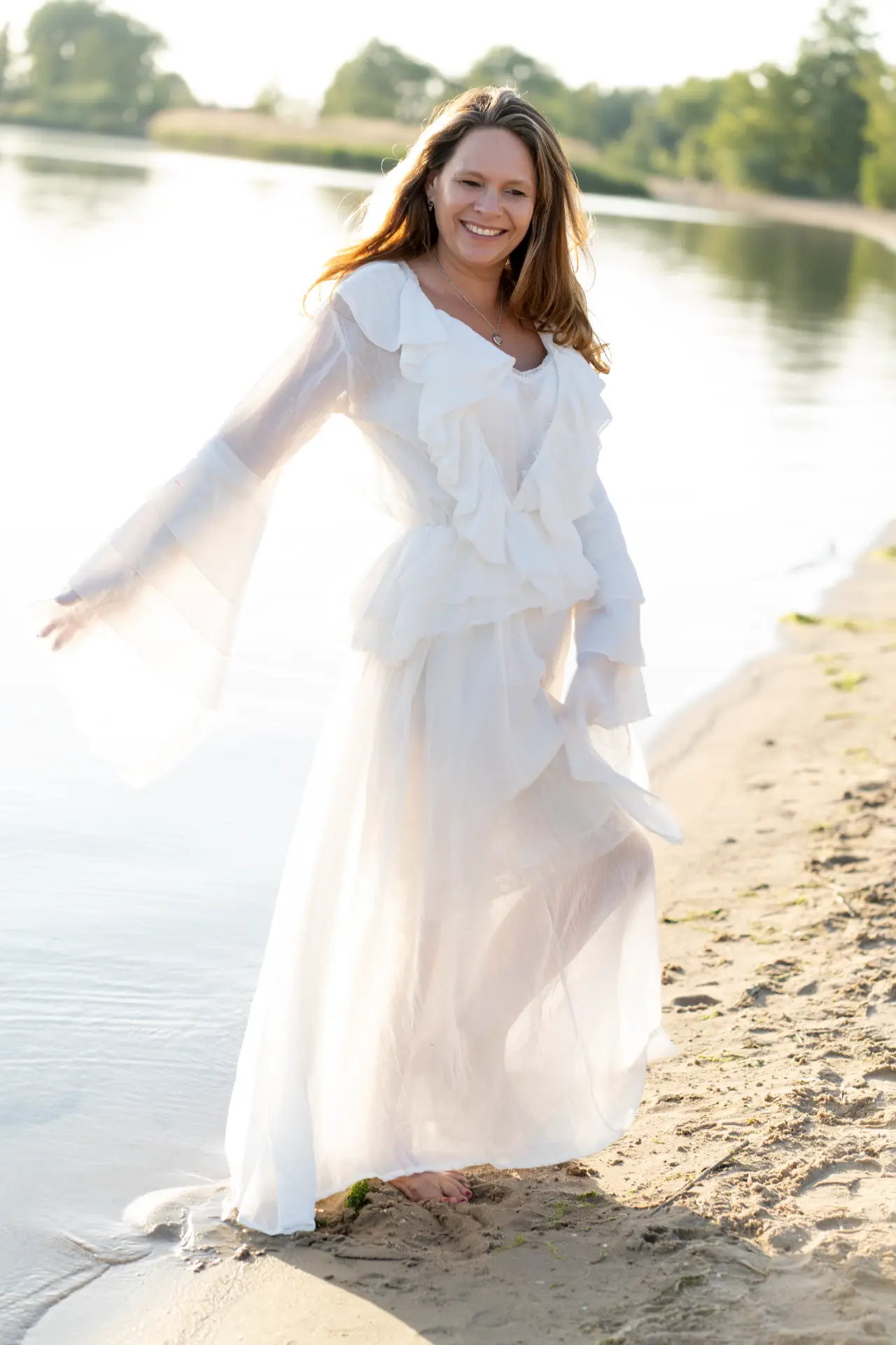 Marjolijn walking along the water's edge