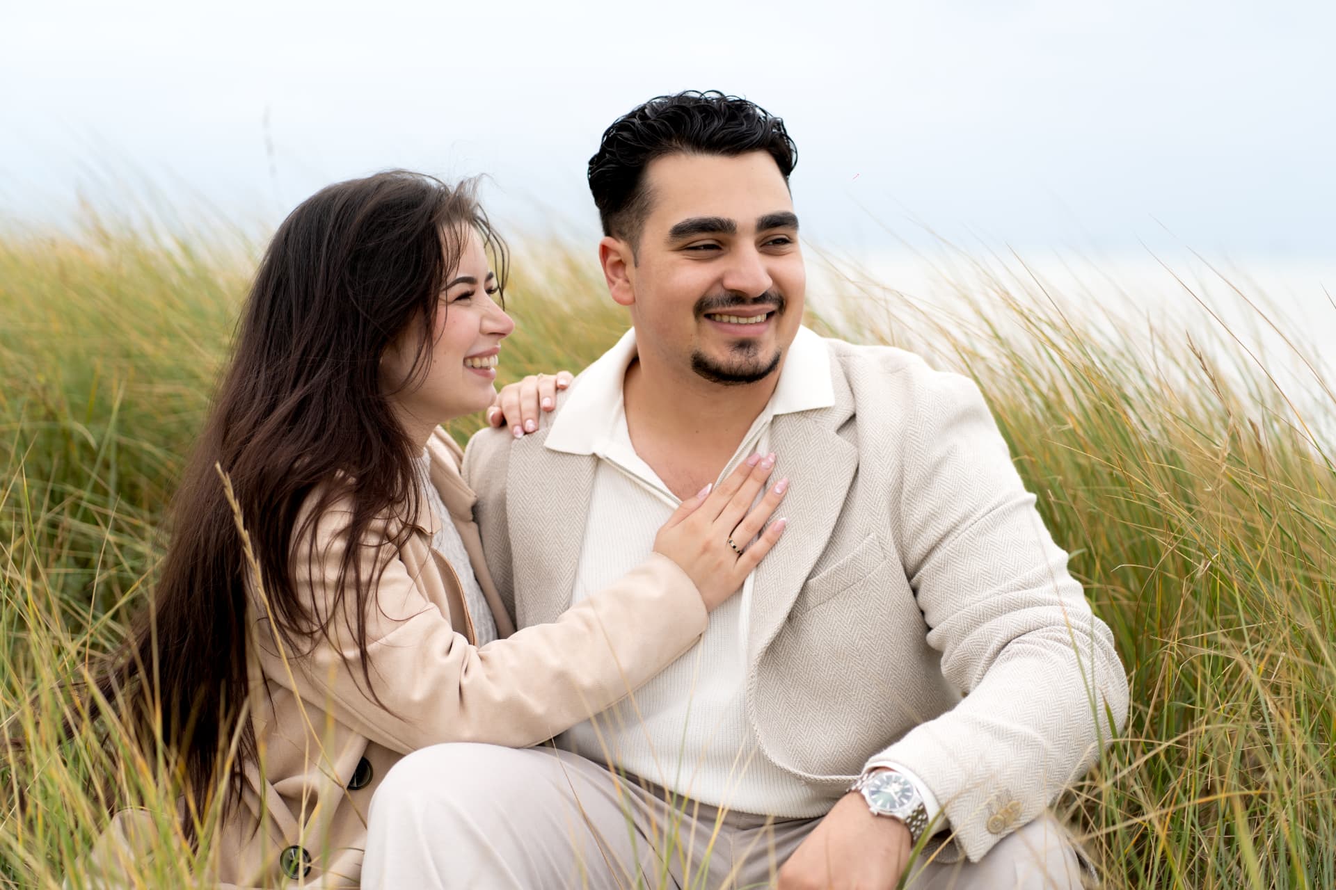 N and Y laughing together in the dunes
