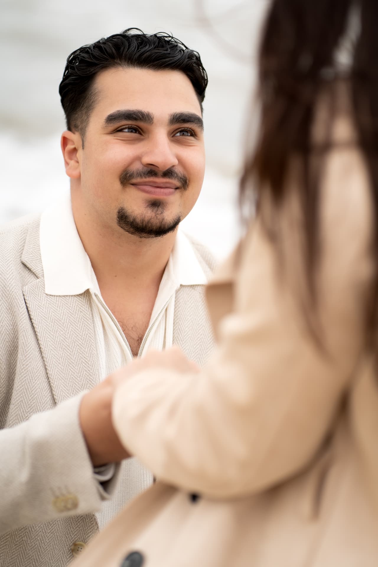 Portrait of the groom-to-be looking at his partner