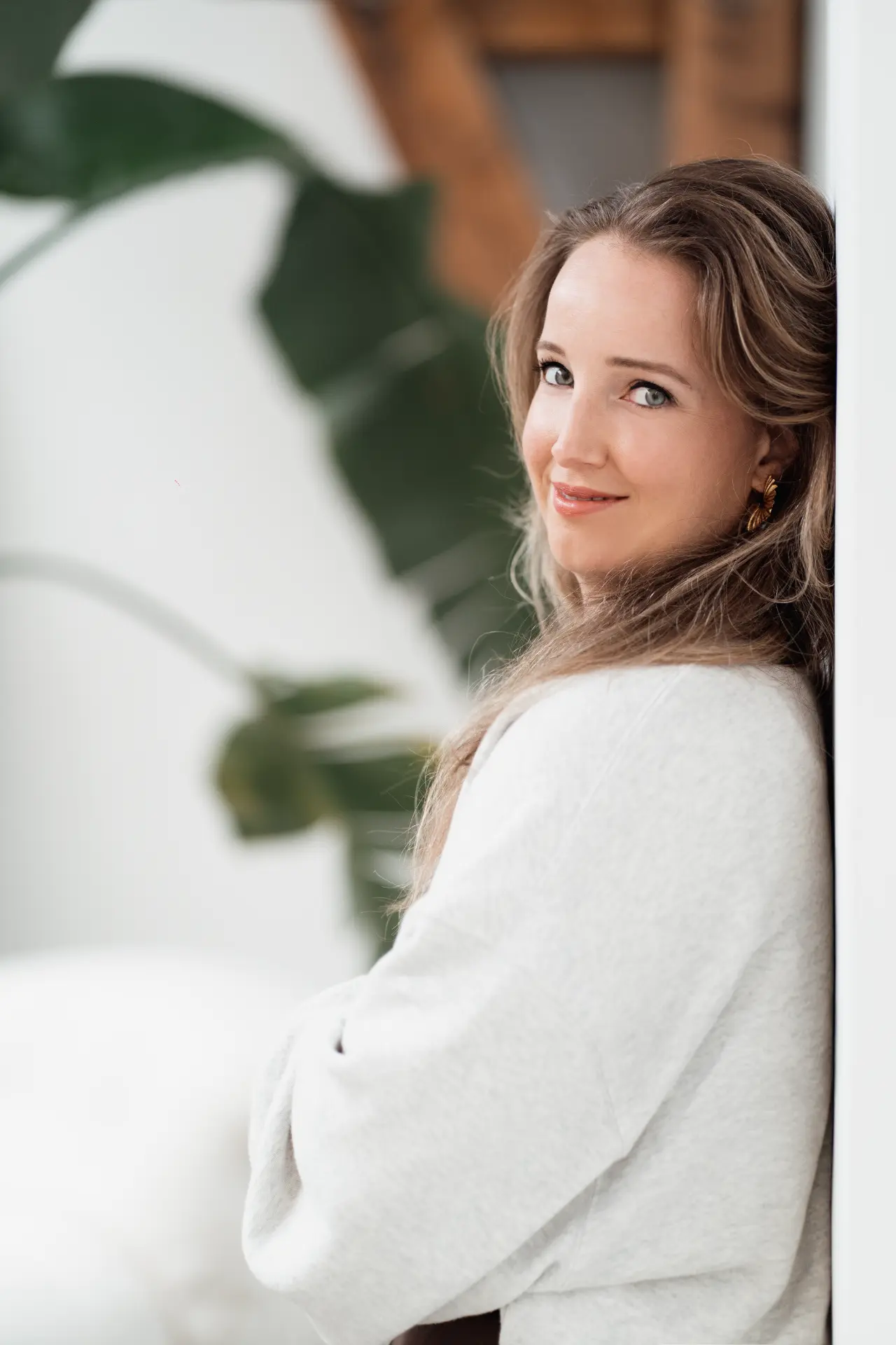 Portrait of Marina beside architectural plants