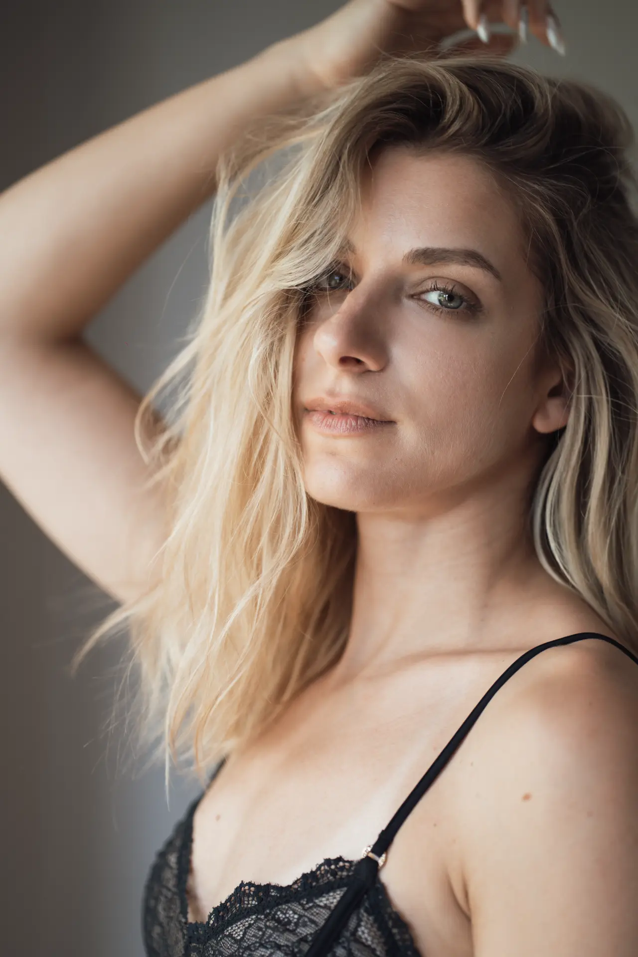 Low-key portrait of Lia looking to the side